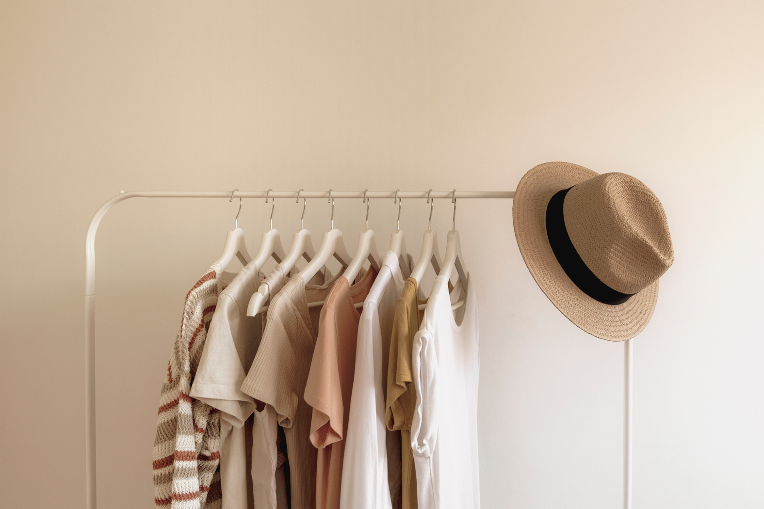 Summer Clothes and Hat on a Rack